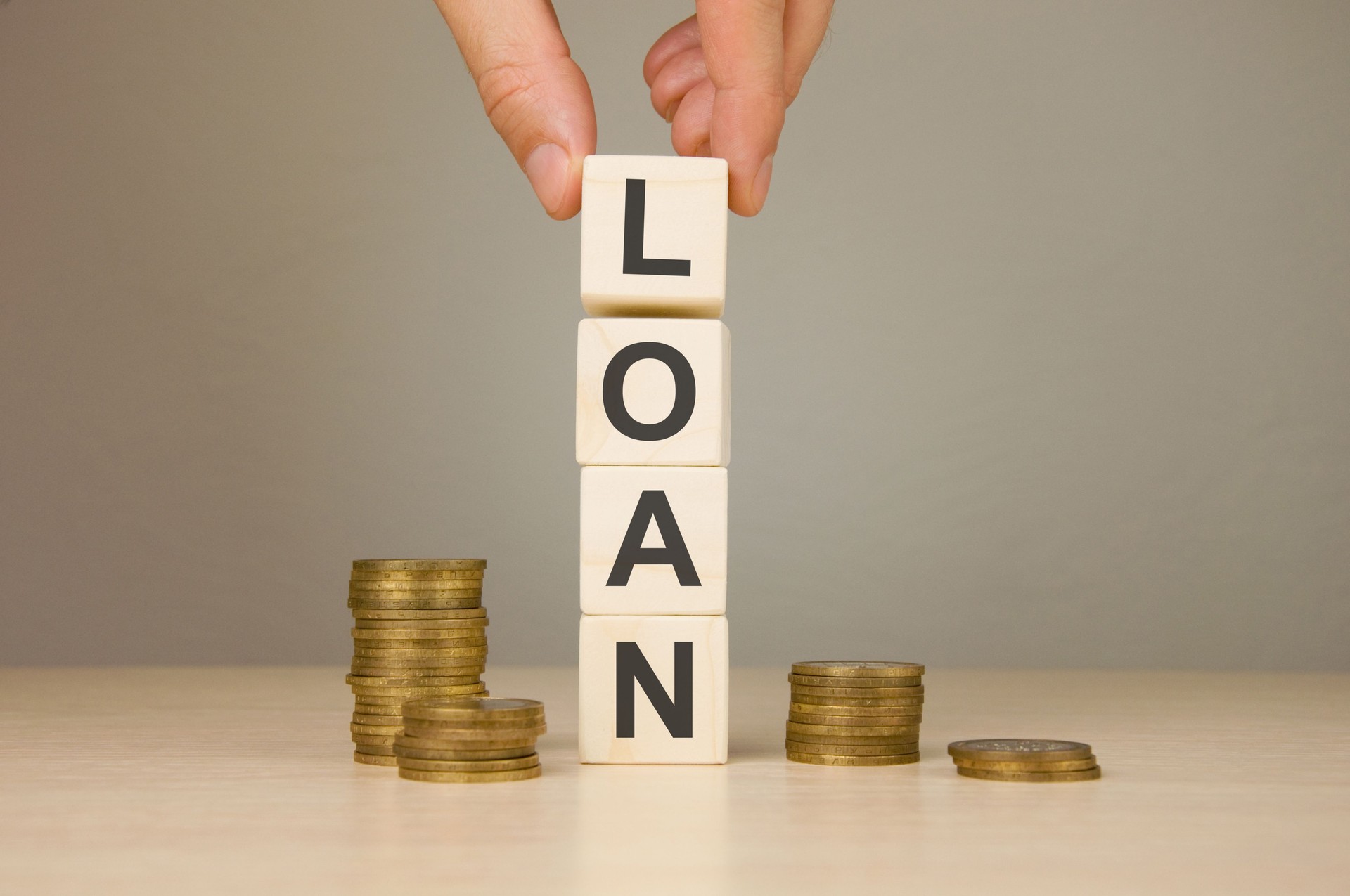 Businessman makes the word loan